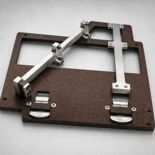 Brown composite carrier fitted with two pivoting aluminum overarm alignment bars, one rotated open and the other closed in place