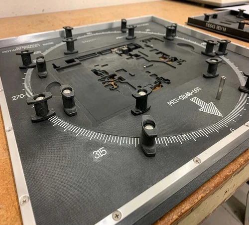 Rotary Wave Solder Fixture showing adjustable rotating plate and composite base